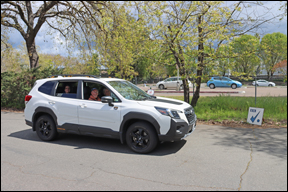 White Subaru SUV leaving start CP